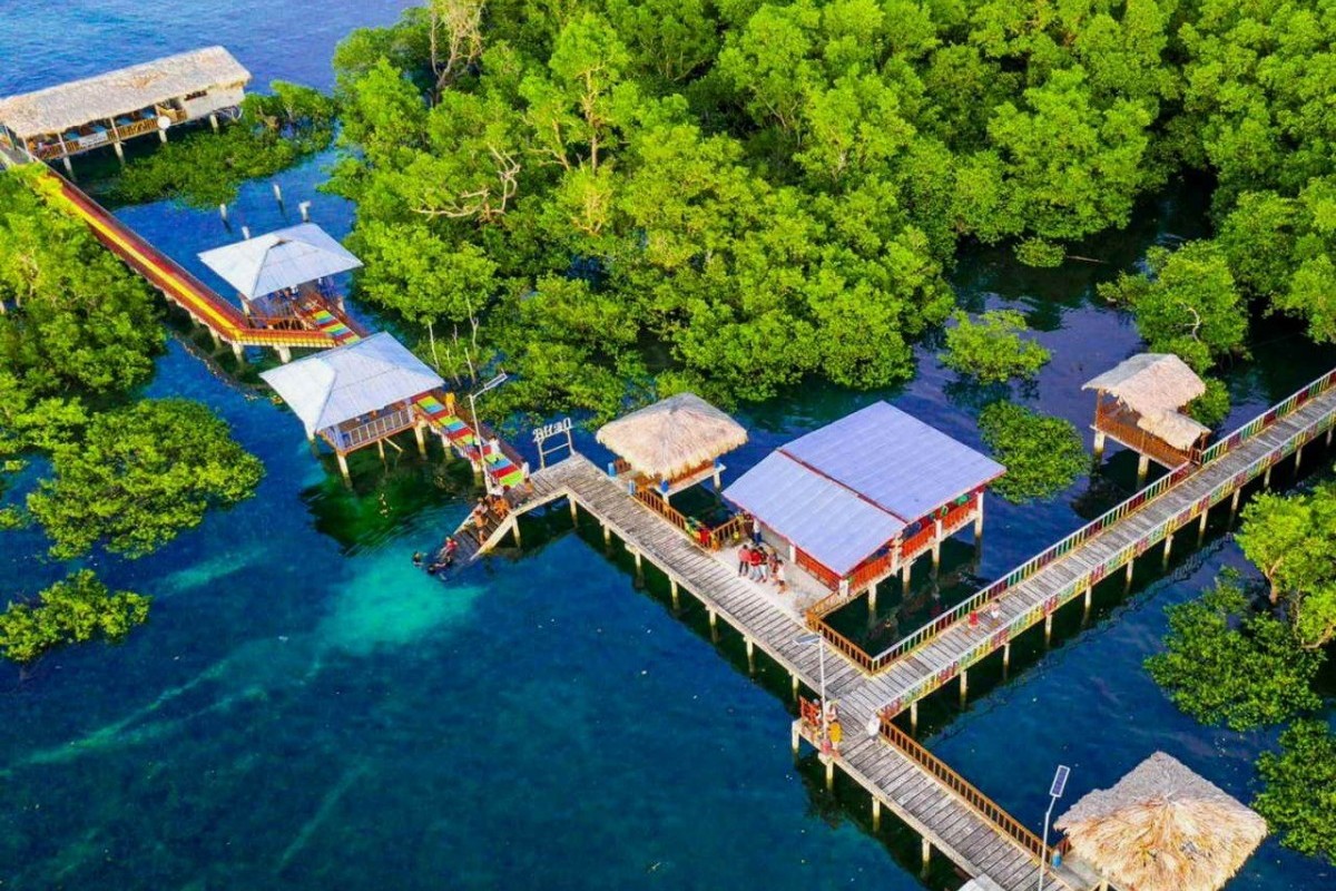 Menikmati Masakan Woku dan Keindahan Alam: Menjelajahi Kampung Indah di Manado yang Seperti Syurga Tersembunyi